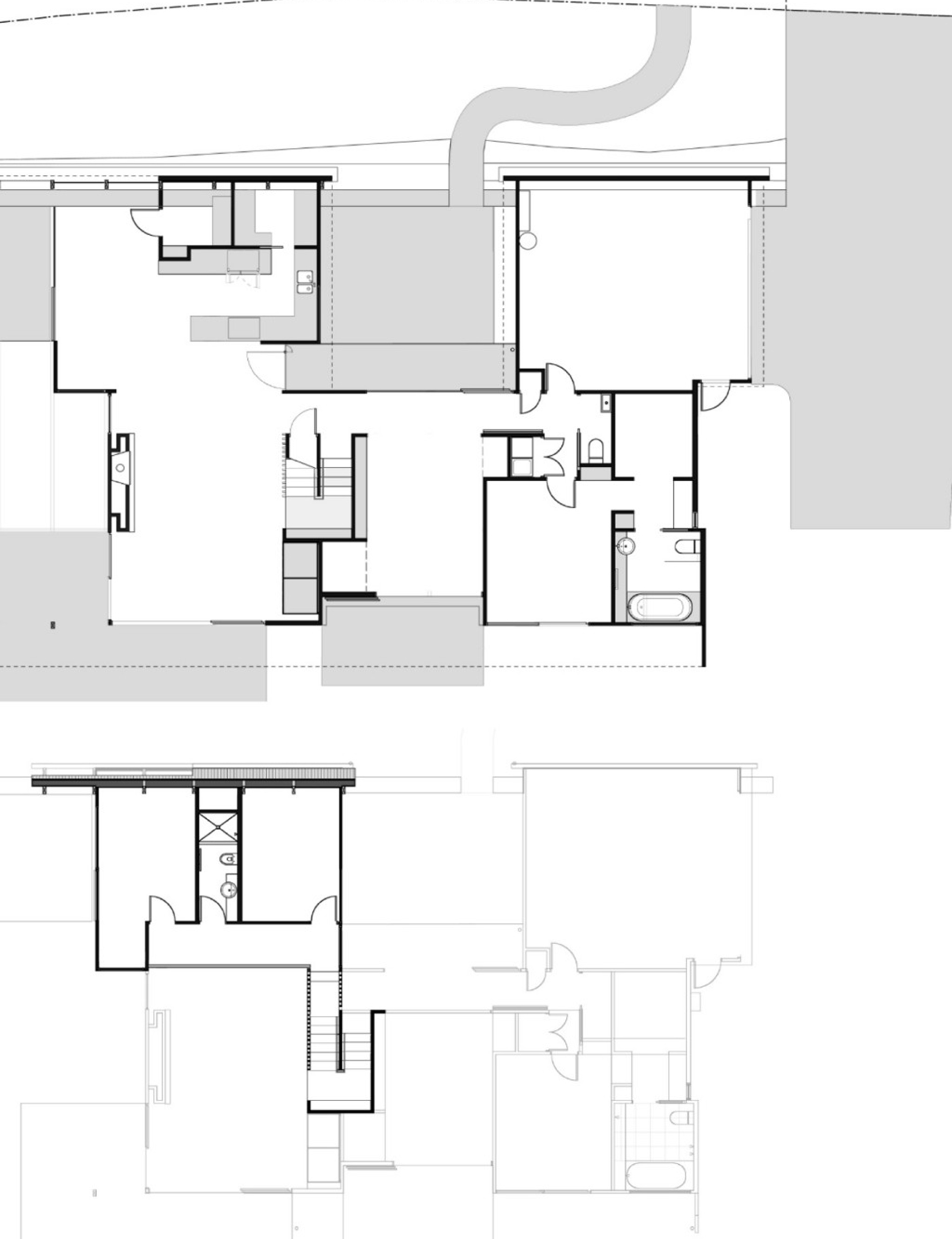 The home's ground floor (top) contains the living spaces and main bedroom, while the upper floor (bottom) contains the spare bedrooms and a bathroom.