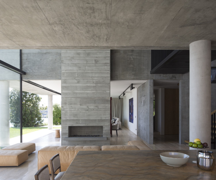 A mighty concrete home on a cliff above Hobson Bay | HOME Magazine