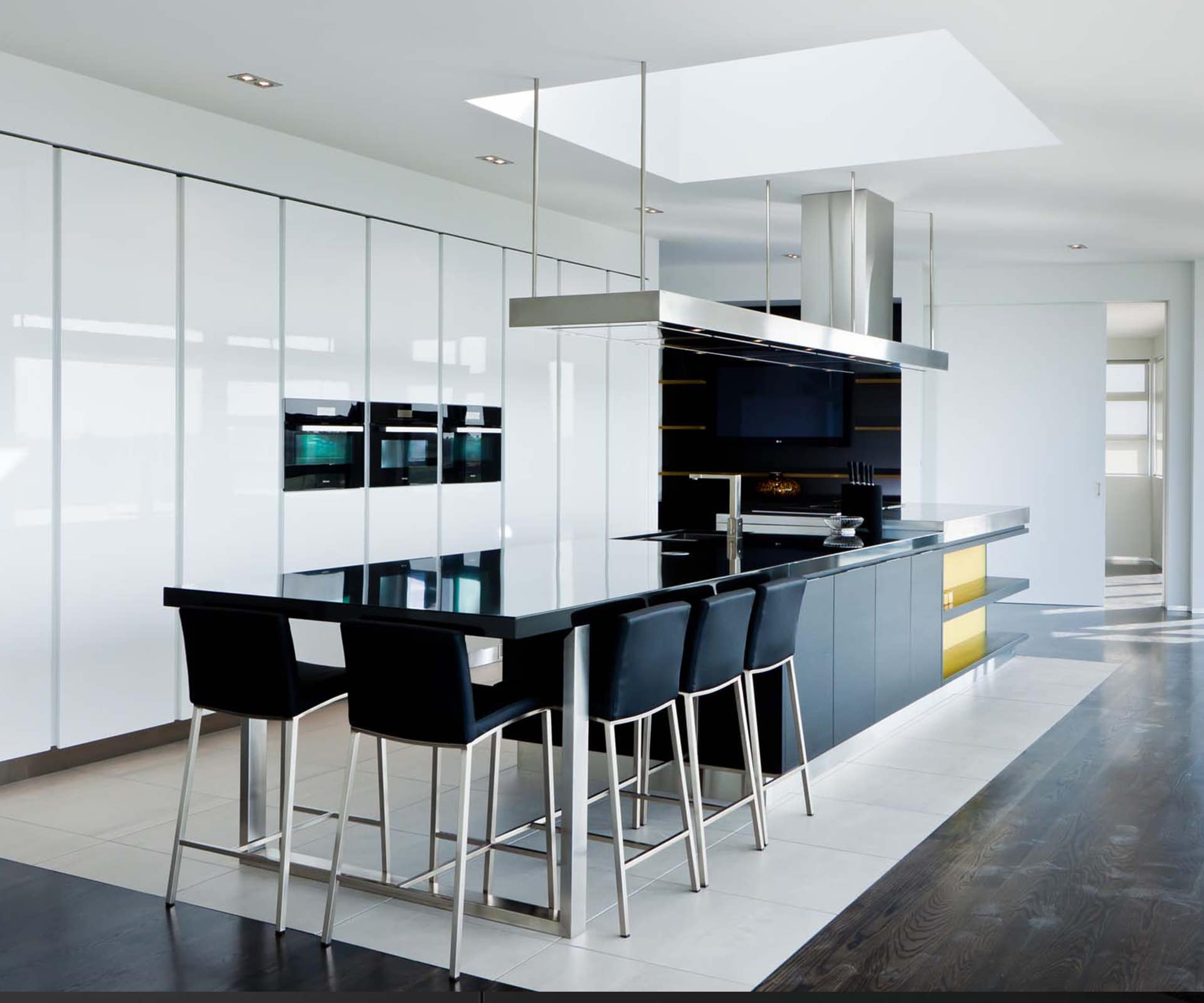 A kitchen in sleek contemporary style by the team at Kitchens By Design. 