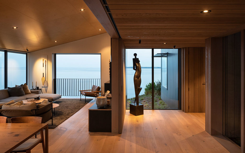 View of the sea through the lounge at dusk