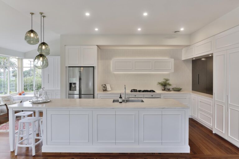 HERO SHOT- rarebirds classi white kitchen design handles drwa and cupboards white tile splashback white ovens